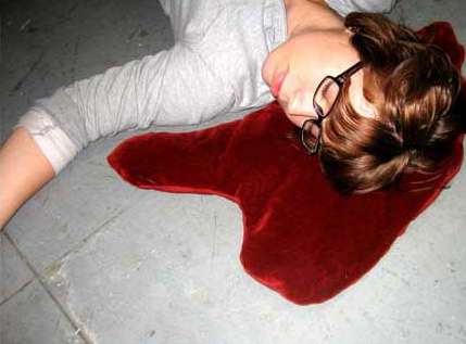 pool of blood pillows...made of garnet velvet. genius. 